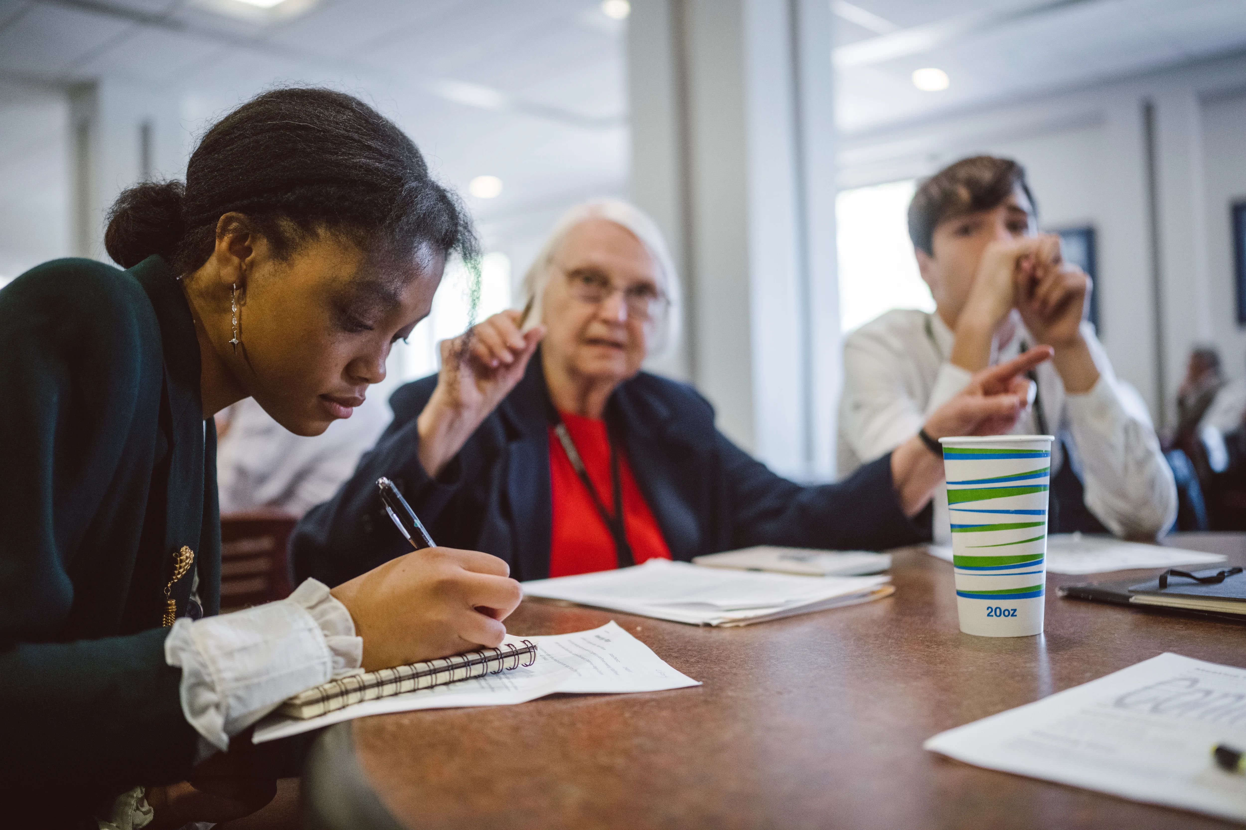 CCL volunteers taking notes during a lobby-day preparation session