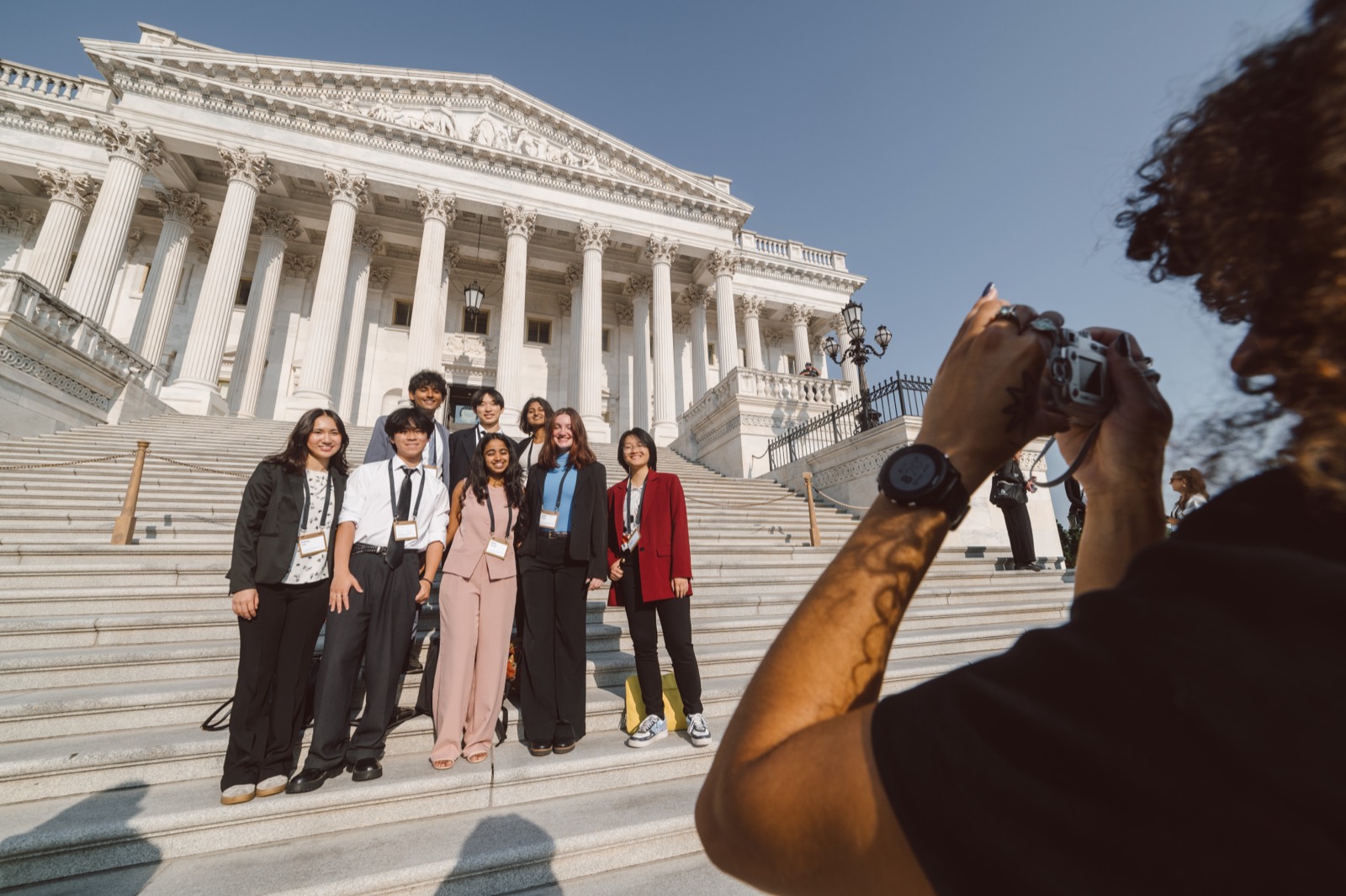 Youth volunteers on the Capitol steps